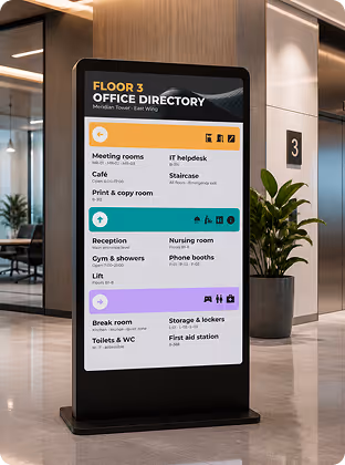 Digital office directory on floor 3 with rooms and facilities listed in a modern lobby area.