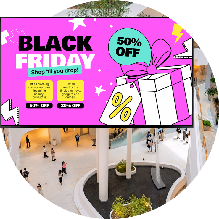 Tela de promoção de Black Friday com 50% de desconto acima do átrio de um shopping